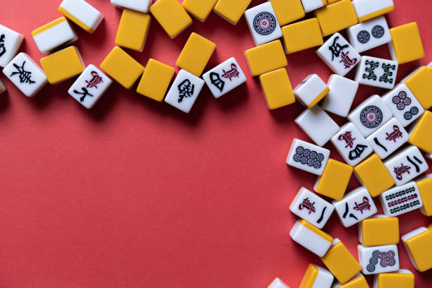 istock Mahjong tiles background on red background 2174359580