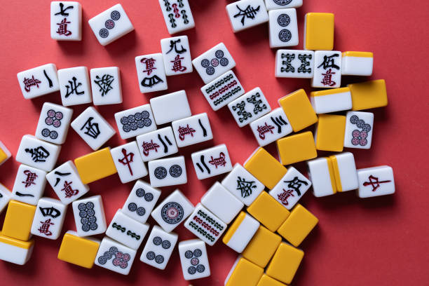 istock Mahjong tiles background on red background 2174359609