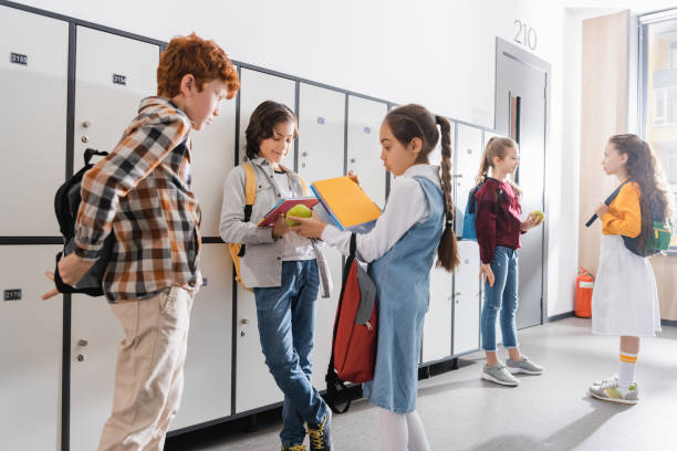 istock Cute students collaborating in a lively classroom, studying and sharing ideas 2174360242