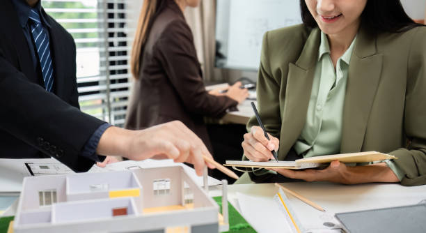 istock Real Estate Project Sales Team Planning Marketing Strategy in Modern Office Setting 2174362844