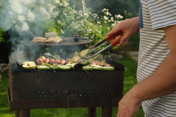 istock Cooking vegetables and meat on grill in backyard in summer 2174366175
