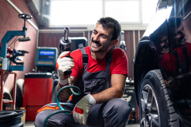 istock Car maintenance - wheels and tires service. 2174366180