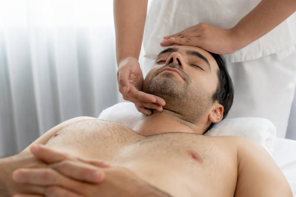 istock Caucasian man enjoying relaxing anti-stress head massage. Quiescent 2174366248