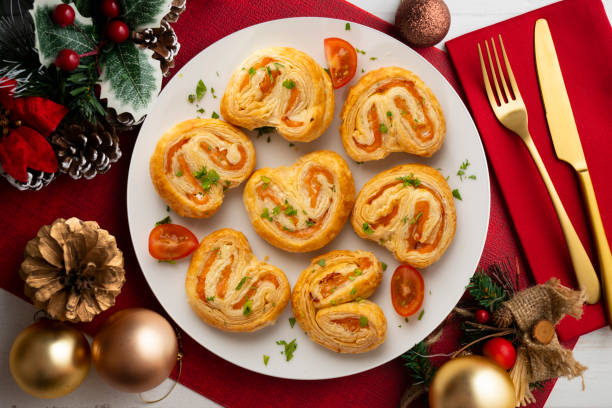 istock Puff pastry filled with salmon and cheese. Top view table with Christmas decoration. 2174367348