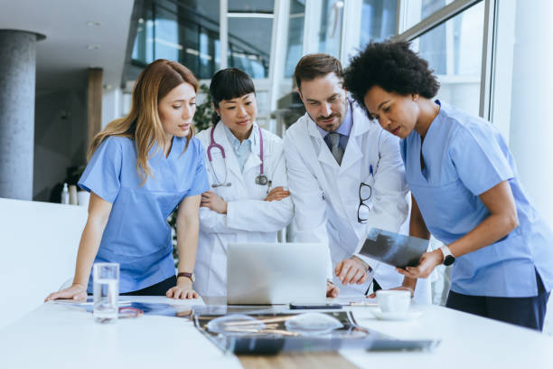 istock Medical professionals examining patient information 2174373956