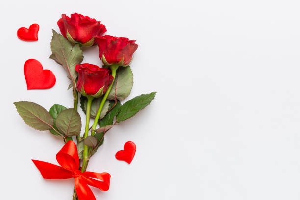 istock Valentine day composition with rose flower and red heart on table. Top view, flat lay, copy space Holiday concept 2174378753