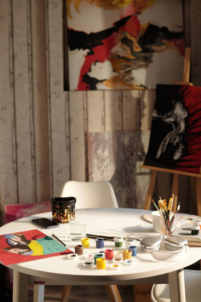istock Art Workspace Featuring Painting Supplies and Creative Area 2174384430