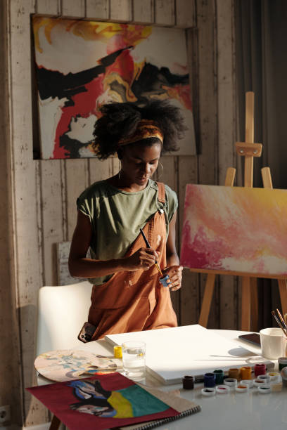 istock Painting in Art Studio with Abstract Artwork 2174384445