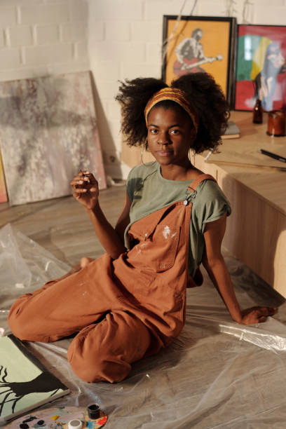istock Creative Young Artist Painting in Studio 2174384546