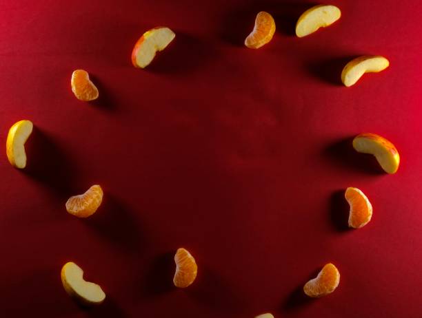 istock Organic fruits apple and orange slice decorated 2174387212