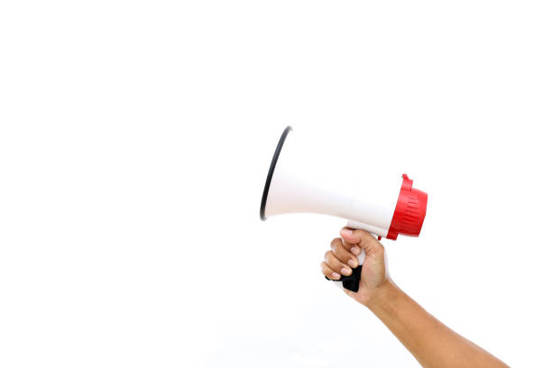 istock Man's hand holding a megaphone isolated on white background 2174396520