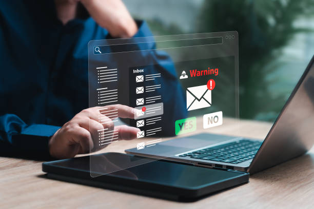 istock Warning alerts for email concept, Inbox and spam viruses, Identity theft scams, Businessman selecting Yes or No from email scammers, Notification and internet communication, security protection alert 2174402130