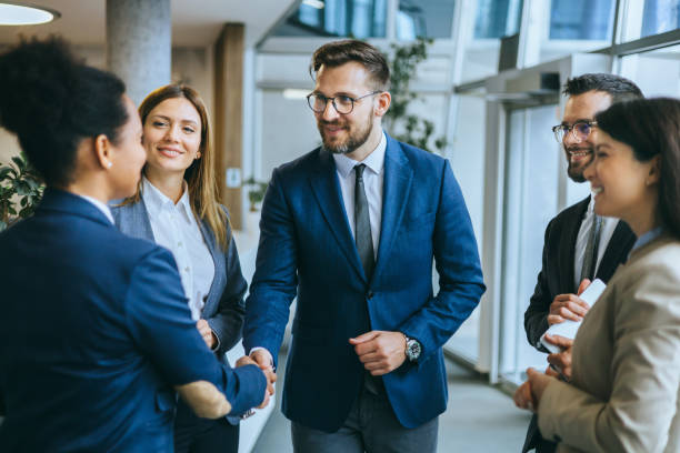 istock Team of professionals discussing in a circle 2174402392