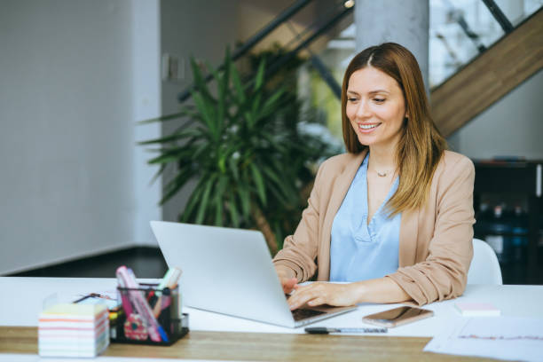 istock Professional business woman using laptop 2174402447