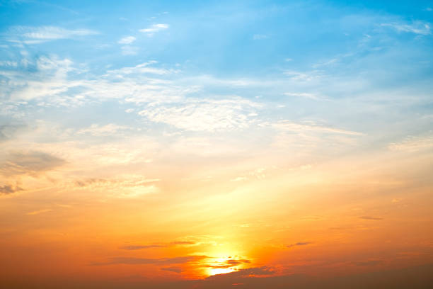 Beautiful , luxury soft gradient orange gold clouds and sunlight on the blue sky perfect for the background, take in everning,Twilight, Large size, high definition landscape photo