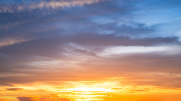 istock Beautiful , luxury soft gradient orange gold clouds and sunlight on the blue sky perfect for the background, take in everning,Twilight, Large size, high definition landscape photo 2174402848
