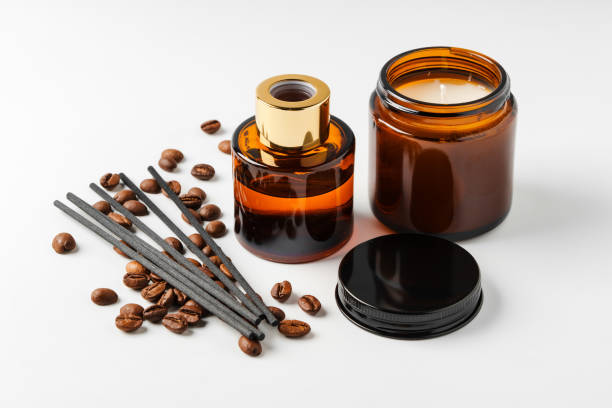 istock Aromatic coffee-scented candles and essential oils with coffee beans and incense sticks 2174404785