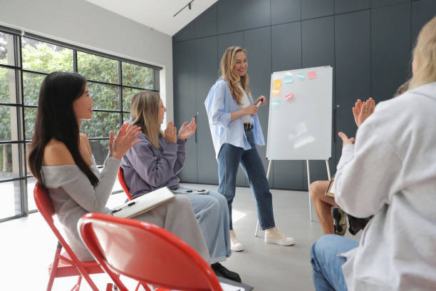 istock Woman presenting during meeting 2174405740