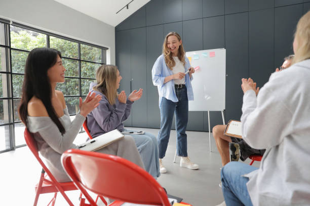 istock Woman presenting during meeting 2174405815