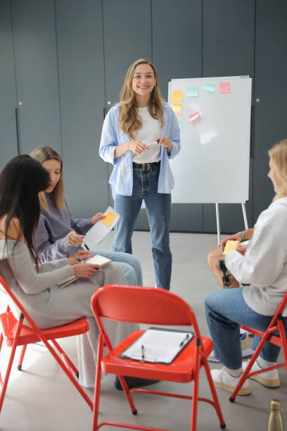 istock Woman presenting during meeting 2174405876