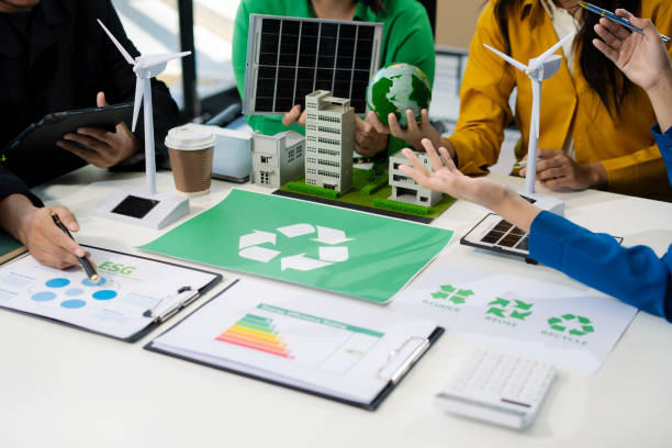 istock Engineer Teamwork Meeting, with partner on model building at company office working technology, Renewable energy-based green businesses and global warming. 2174408103