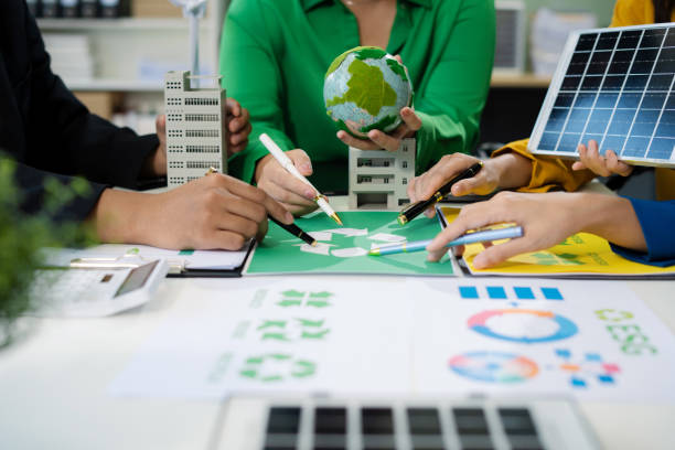 istock Engineer Teamwork Meeting, with partner on model building at company office working technology, Renewable energy-based green businesses and global warming. 2174408106
