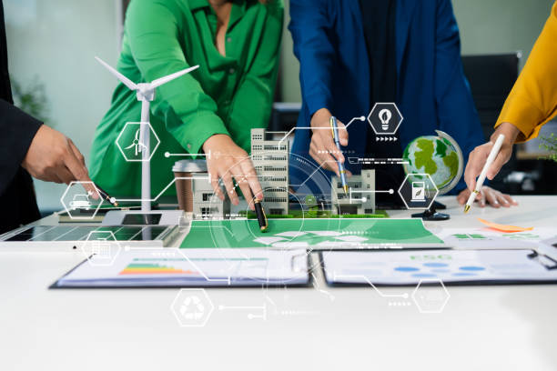 istock Engineer Teamwork Meeting, with partner on model building at company office working technology, Renewable energy-based green businesses and global warming. 2174408116