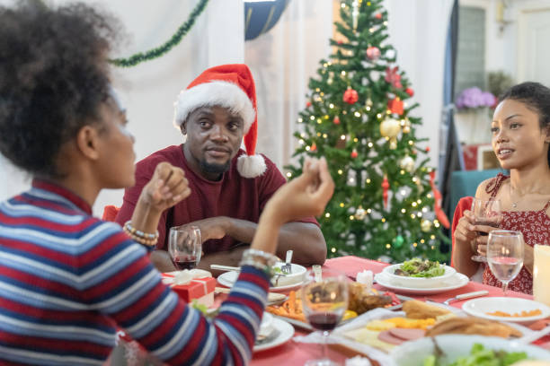istock Black Family Christmas Dinner Celebration 2174411253
