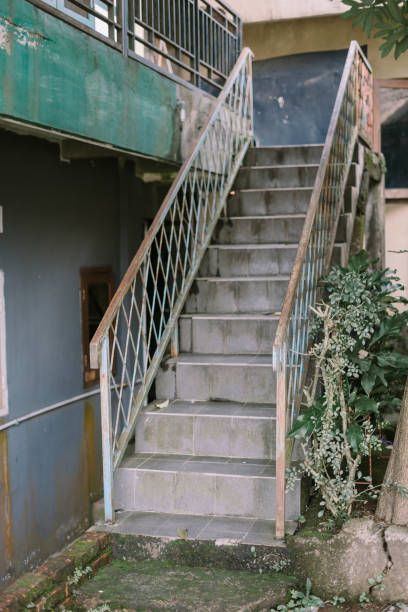 istock Staircase leading to the upper floor, showcasing a smooth ascent with clean, modern lines 2174414122