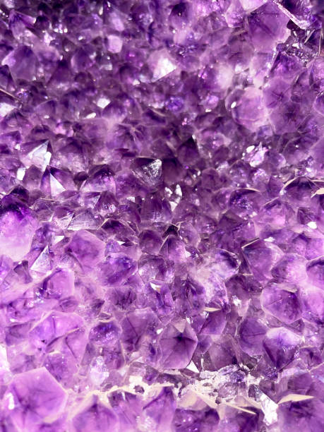 istock Texture of natural amethyst crystals. Natural background. 2174414189