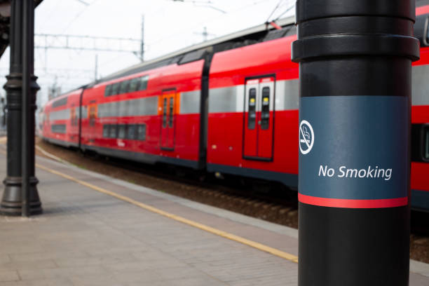 istock No smoking sign on platform with train in background 2174420589
