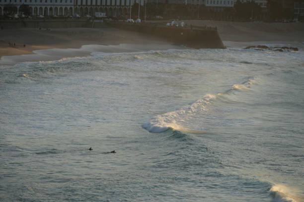A Coruna Galicia Spain on February 2, 2024 Orzan beach by sunset aerial view.