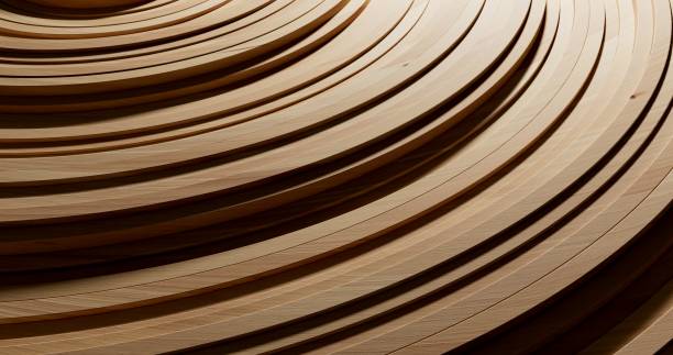 istock Close-up of wooden strips intricately wound in multiple concentric circles 2174423578