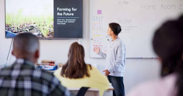 istock Learning, farming and presentation with student in classroom for education, sustainability and school. Environment, global warming and future with people for course, development and academy. 2174424642
