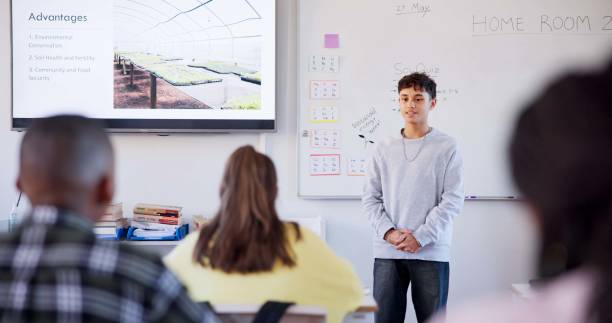 istock Learning, agriculture and presentation with student in classroom for education, sustainability and energy. Environment, global warming and future with people for course, development and academy. 2174424653