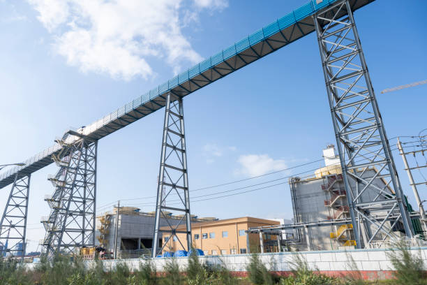 Steel giant excavator machine with conveyor bridge used in brown coal opencast mining,  Germany