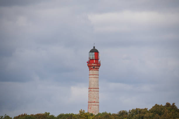 Red and whitr striped lighthouse and clear blue sky on island Sylt, Germany