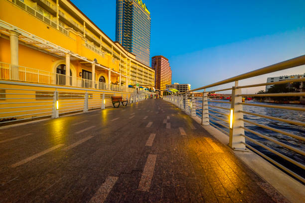 istock Colorful river walk under a blue sky at sunset in Tampa 2174428109