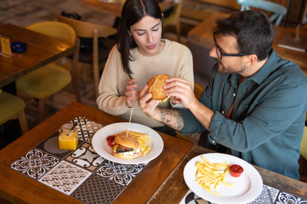 istock Couple sharing food 2174428655