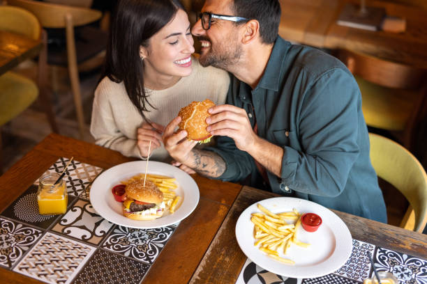 istock Kiss first then eat 2174428686