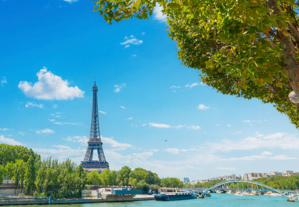 istock World famous Eiffel tower seen from Seine river on a sunny day 2174430493