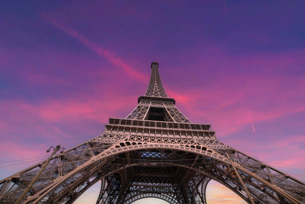 istock Pink sky over the world famous Eiffel tower at sunset 2174432041