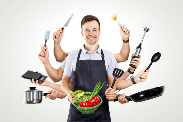 istock Man with Multiple Arms Holding Kitchen and Cooking Equipment 2174434448