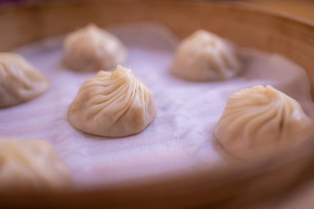 istock Steaming Hot Xiaolongbao: A Delicate Chinese Dumpling Treat 2174436523