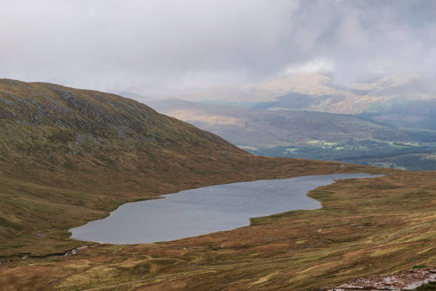 istock Mountain valley with a lake, in Scottish highlands near Ben Nevis. 2174436663