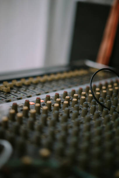 istock An audio mixer with its knobs and sliders meticulously adjusted, embodying precision and control in the art of sound engineering and music production 2174437528