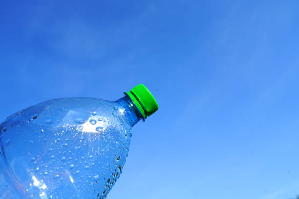 istock Plastic bottle on blue sky background. Plastic recycling and waste collection. 2174443281