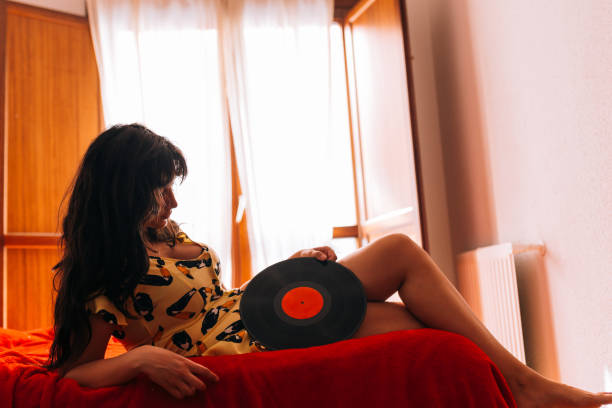 Woman holding a guitar
