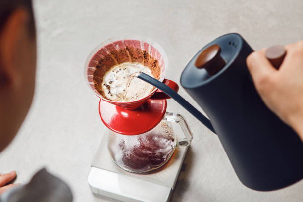 istock Person Pouring Drink Into Pitcher 2174445701