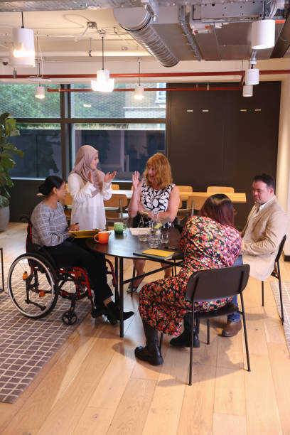 istock Coworkers having meeting in modern office 2174445997